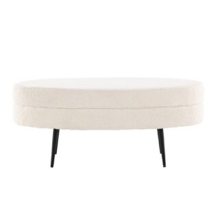 Oval sittpuff i vitt teddytyg med svart metallstomme i modernt hem