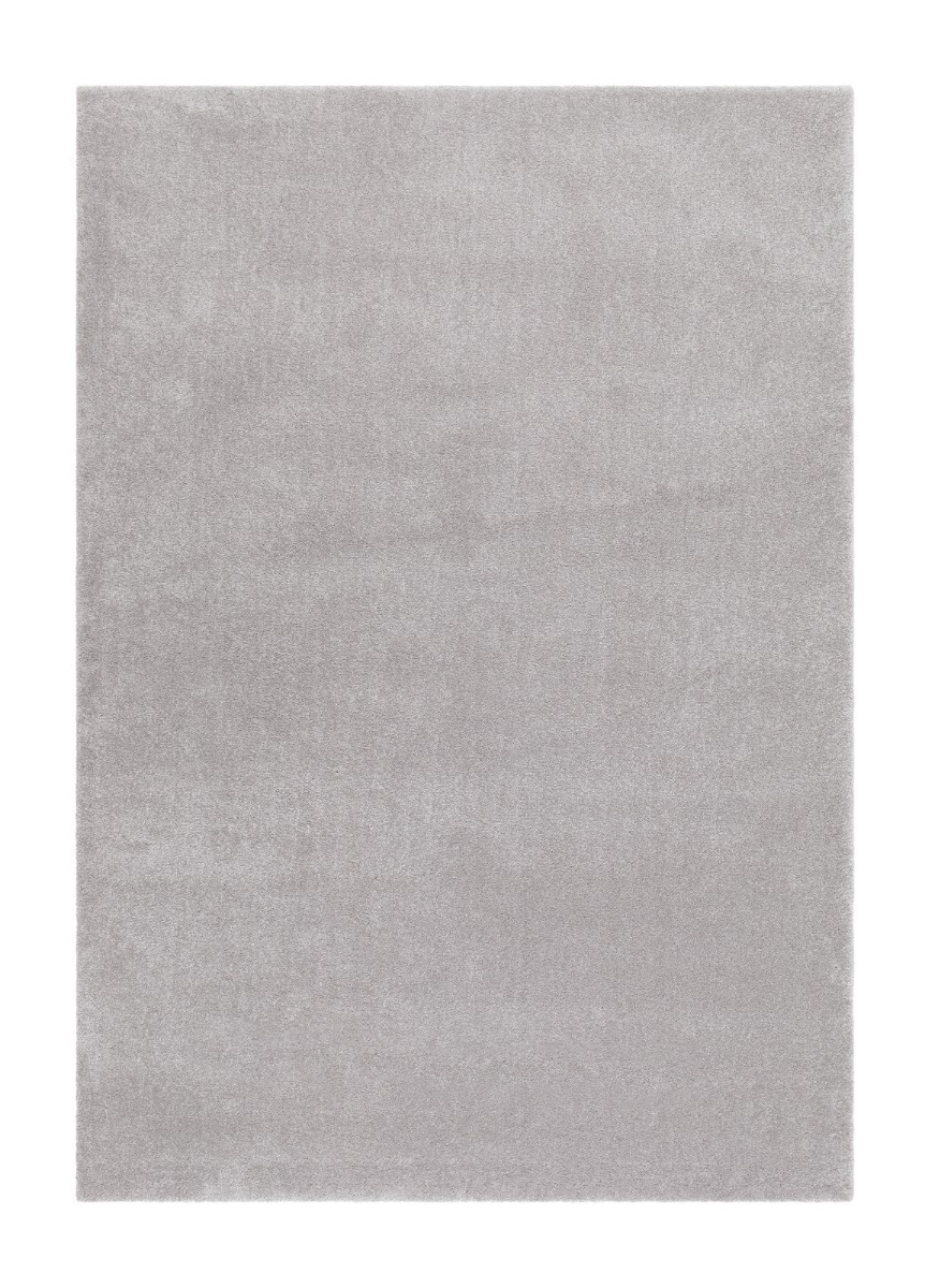 Silvergrå ryamatta i mjuk mikrofiber med skimrande lugg på trägolv