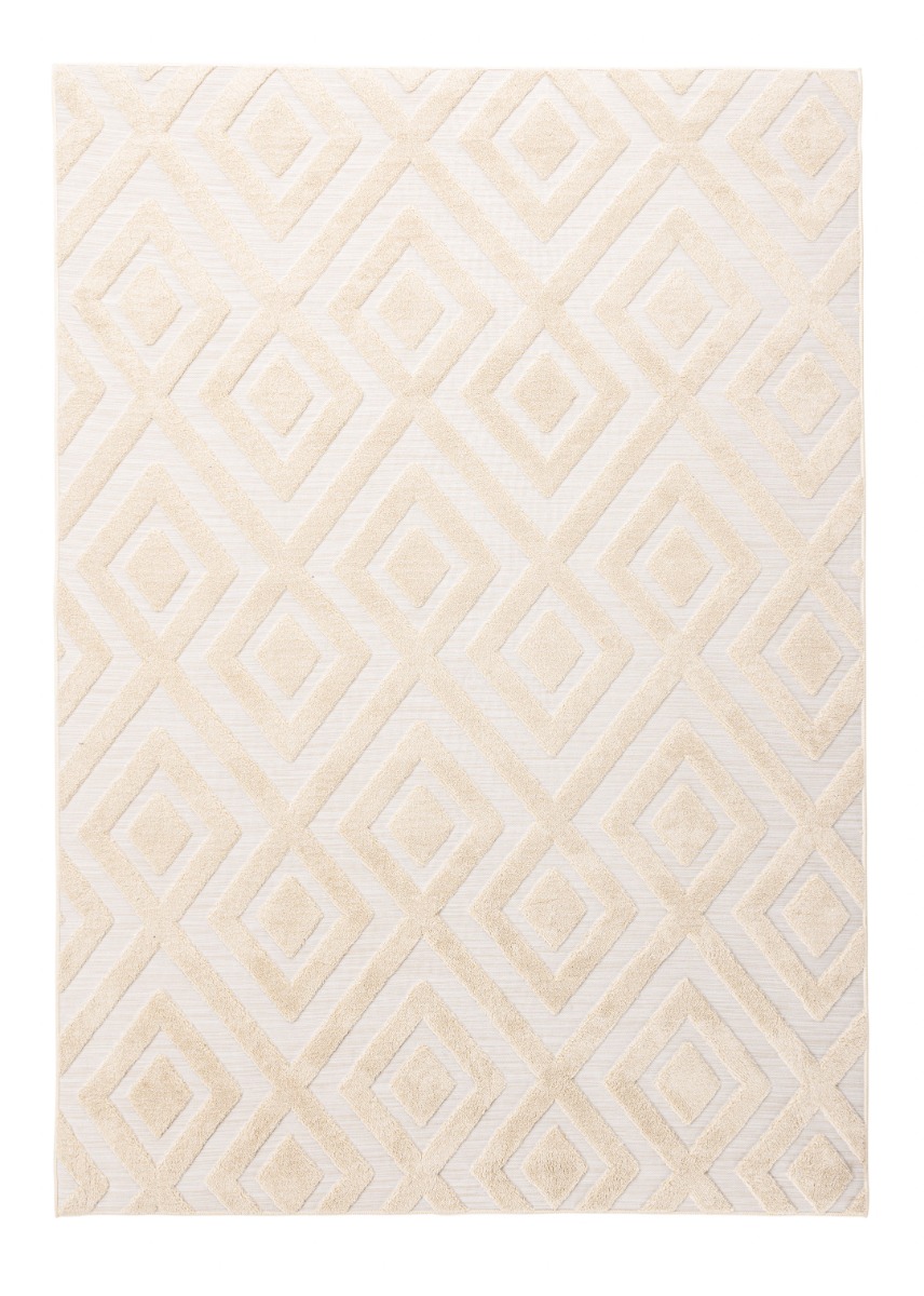Beige ryamatta Ana i mjuk polyester med tjocklek cirka 15 mm placerad i vardagsrum