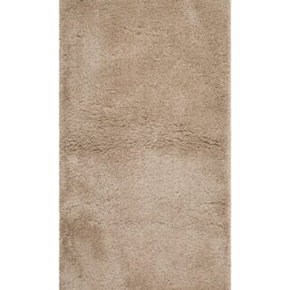 Barbet Natur ryamatta med mjuk lång lugg i neutral beige ton placerad i vardagsrum