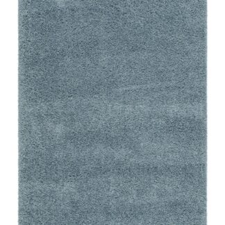 Komon blå maskinvävd ryamatta med mjuk yta och diskret glans