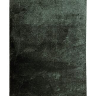 Grön ryamatta Terri med kort glansig lugg och tjocklek cirka 20 mm placerad på golv