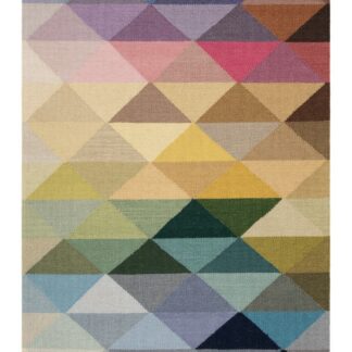 Handvävd flerfärgad ullmatta Rannik med mjuk textur och varm ton vid vardagsrumsgolv