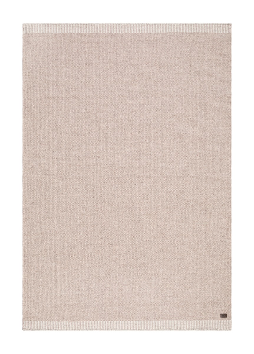 Handvävd naturfärgad ullmatta Rachel med mjuk textur och elegant avslutning