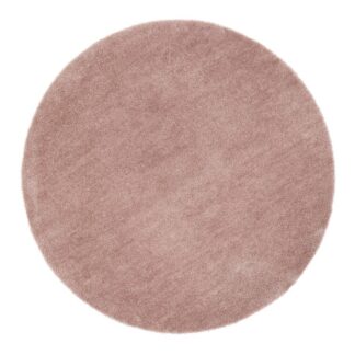Rund mjuk rosa matta i mikrofiber med filtbaksida på trägolv