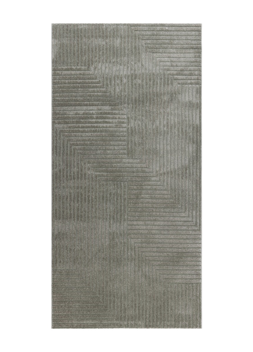 Grön Tesina gångmatta med mjuk yta och jutevävbaksida i modernt vardagsrum