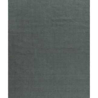 Handvävd ullmatta i smaragdgrönt med tät väv och mjuk textur