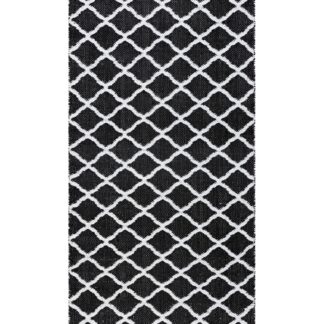 Svart vändbar plastmatta Mimmi Dalli med grafiskt mönster handvävd i PVC