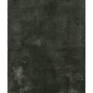 Mjukt grönt pälsliknande golvmatta med tjock textur i modernt hem