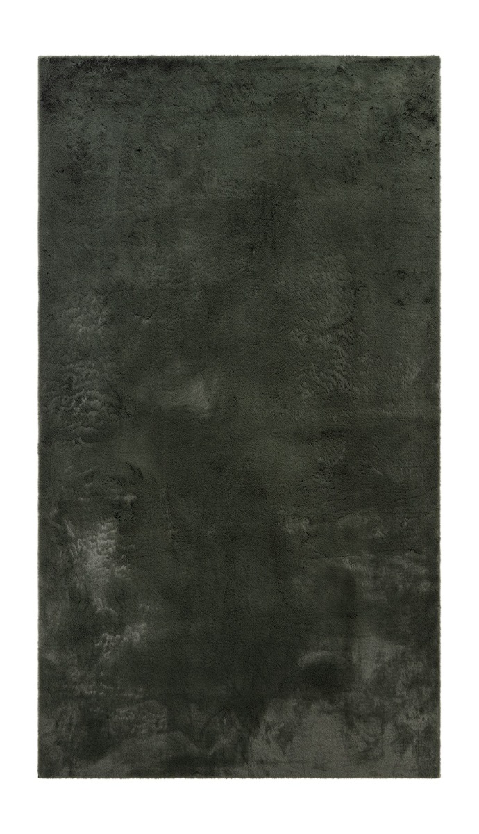 Mjukt grönt pälsliknande golvmatta med tjock textur i modernt hem