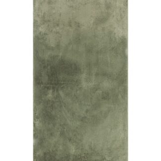 Smaragdgrön mjuk ryamatta med lätt glans och halkfri undersida i heminredning