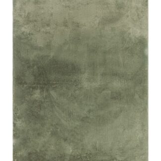 Mjuk smaragdgrön ryamatta med lätt glans och halkfri undersida i vardagsrum