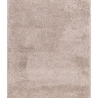 Lucid mjuk ryamatta i linnefärgat polyester med tjock, hög lugg i vardagsrumsmiljö