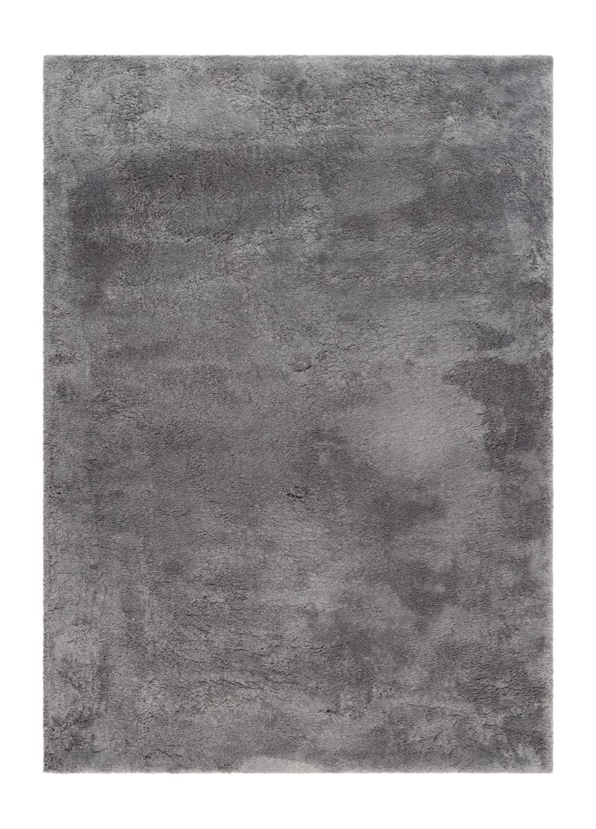 Grå mjuk ryamatta med tjock lugg på vardagsrumsgolv