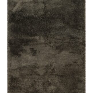 Smaragdgrön ryamatta med tjock och mjuk lugg på golv i modernt rum