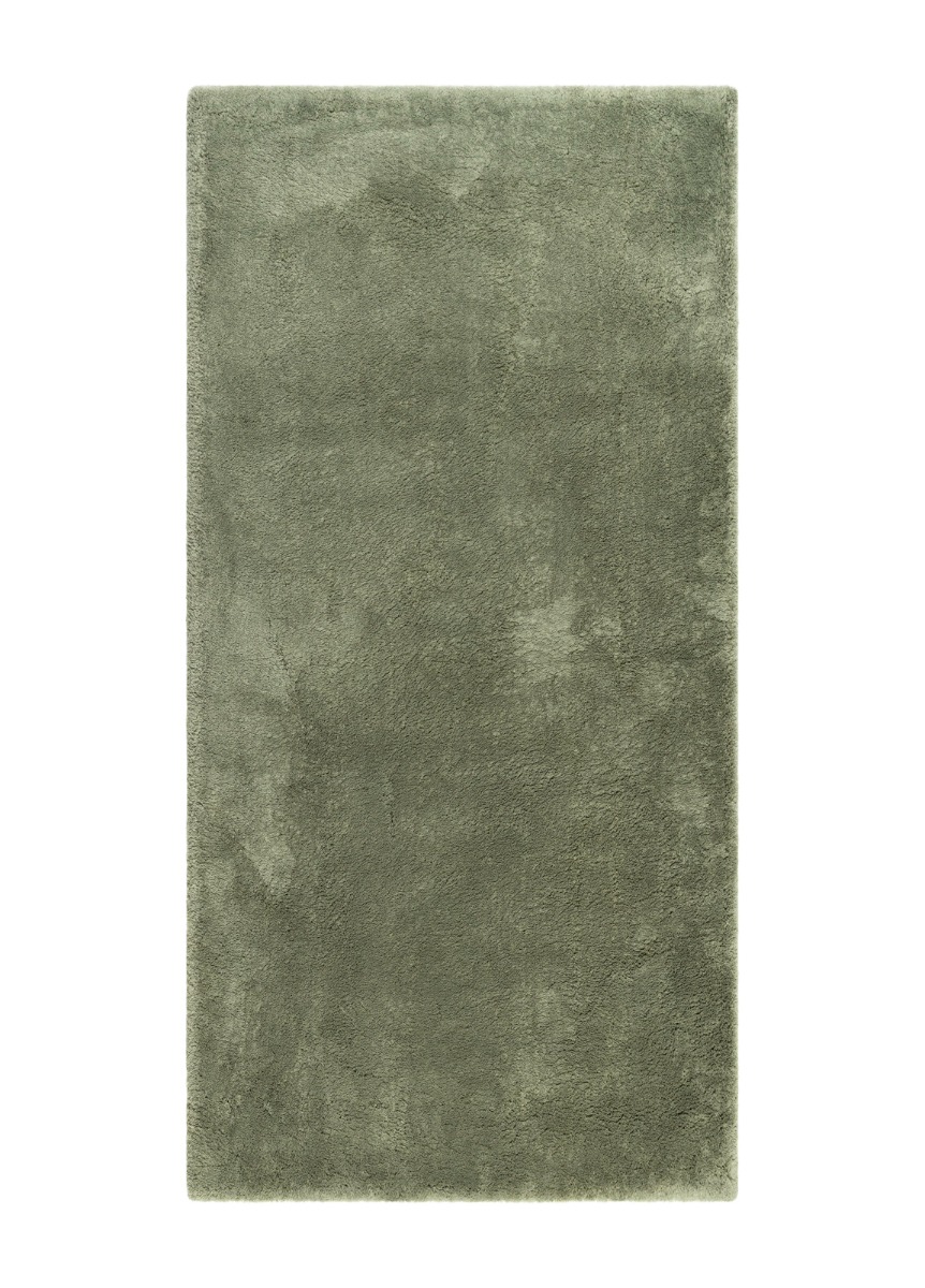 Grön ryamatta med hög lugg som skapar mjuk och varm golvkomfort