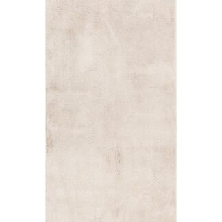 Naturfärgad mjuk ryamatta med tjock lugg i vardagsrumsmiljö