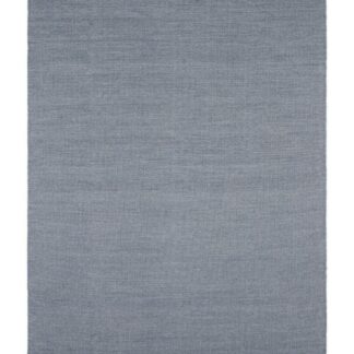 Blå ull- och bomullsmatta med mjuk textur och cirka 5 mm tjocklek