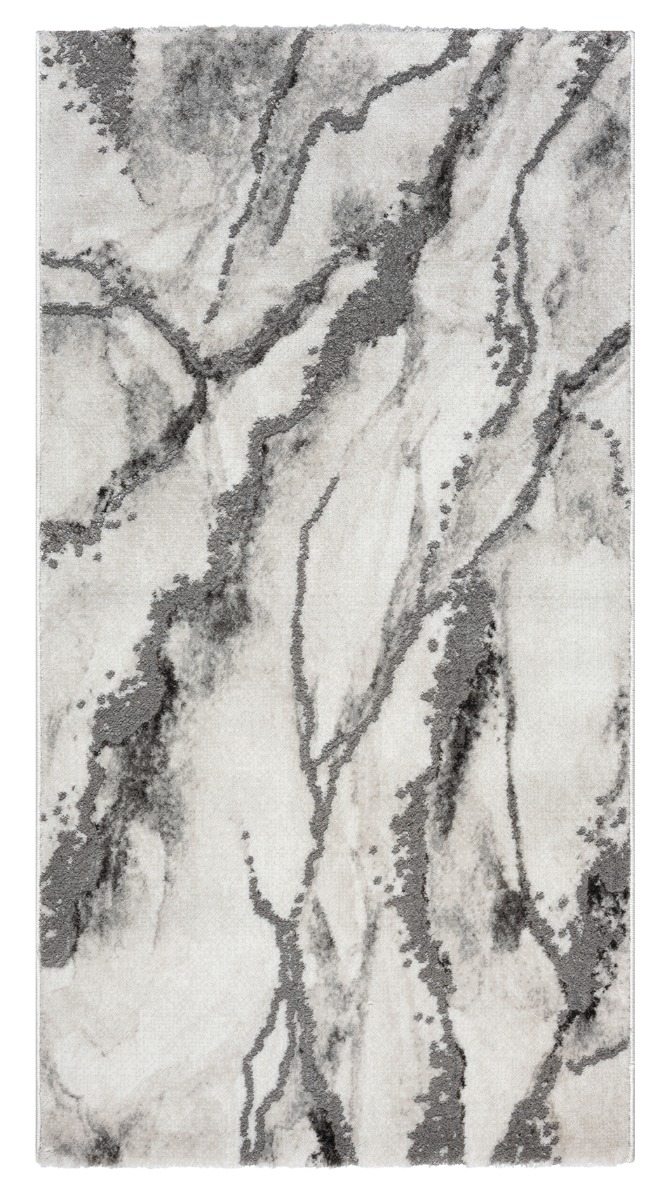 Silverfärgad Wiltonmatta med elegant marmormönster placerad på golv i modernt vardagsrum