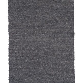 Grå ullmatta med tjock struktur i ett modernt vardagsrum