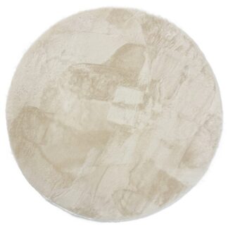 Rund beige pälsmatta i polyester med mjuk tjock yta i ett modernt vardagsrum