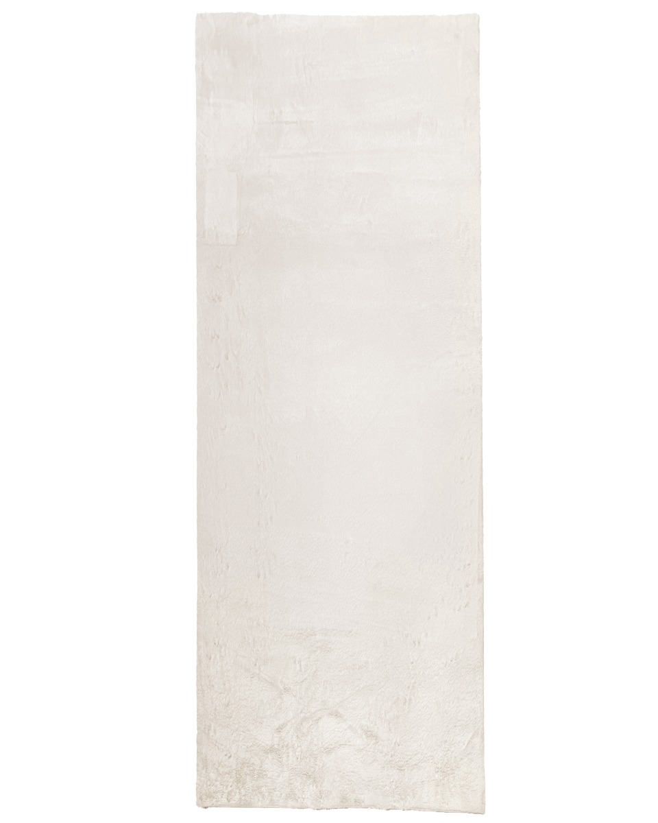 Offwhite mjuk gångmatta i polyester med pälslugg placerad i hall