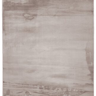 Taupe tvättbar pälsmatta med tjock lugg och gummibaksida placerad på golv