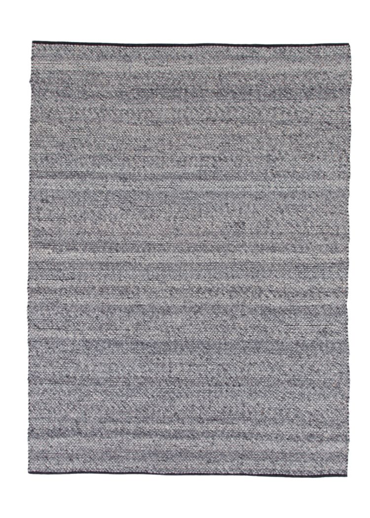 Grå ullmatta Cirelle med mjuk textur i naturligt ull och bomullsmaterial