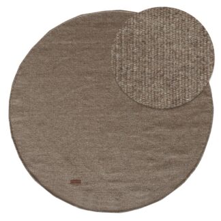 rund brun ullmatta Dalen med kortklippt yta i elegant modern inredning