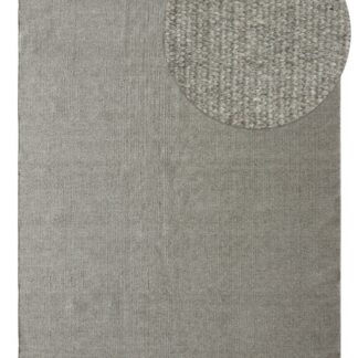 Grå ullmatta med mjuk textur och cirka 10 mm tjocklek i modern inredning