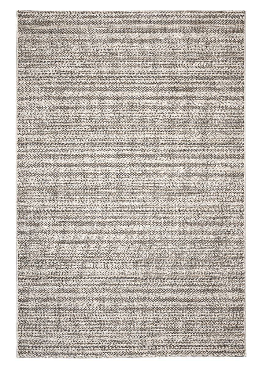 Grå polypropylenmatta Filip med lila och beige inslag lagt på en uteplats