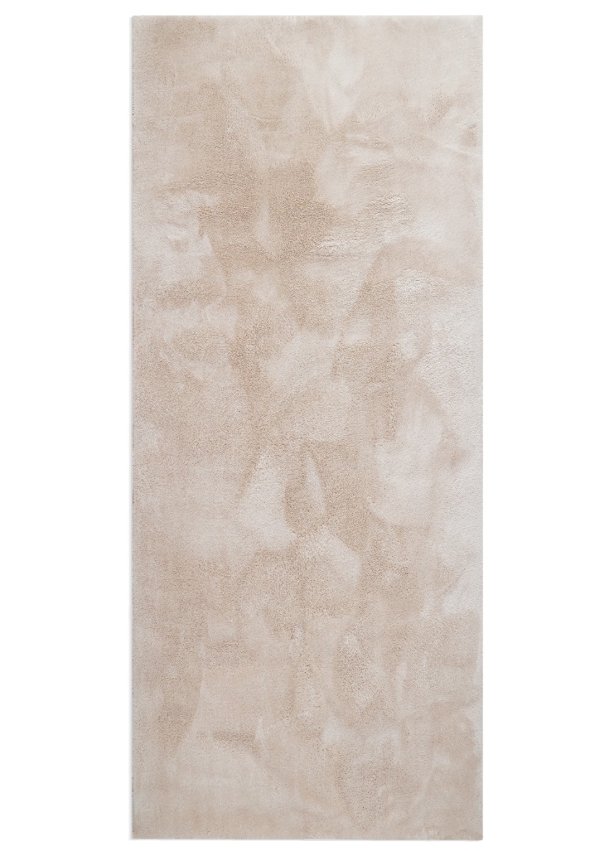 Fluffig beige ryamatta i polyester med tjock och mjuk struktur i modernt vardagsrum