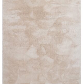 Fluffig beige ryamatta i mjuk polyester med tjock struktur på golv i hemmet