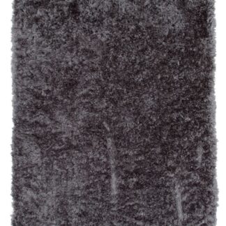 Mörkgrå mjuk ryamatta i polyester med lång lugg och skimrande yta i ett modernt vardagsrum