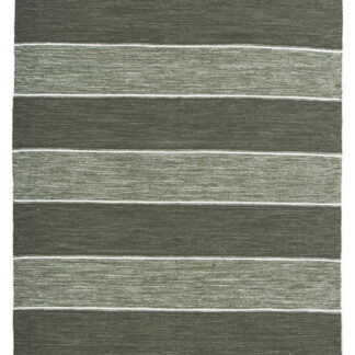 Grön bomullstrasmatta med mjuk och tjock textur i hemmiljö