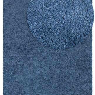 Blå mjuk ryamatta med tjock, fluffig textur i modernt hem