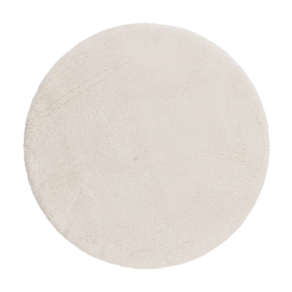 Krämvit mjuk ryamatta med tjock lugg i ett vardagsrumsmiljö