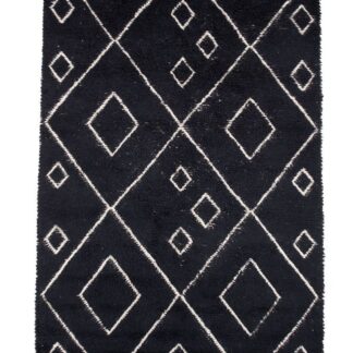 Tjock svart ullmatta Lunora med mjukt och isolerande material på golv