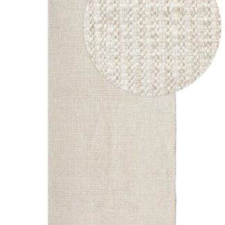 Offwhite kortskuren ullmatta Molly liggande på golv i modernt rum