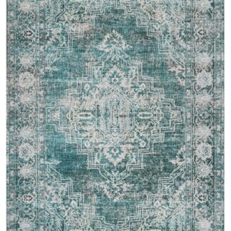 Närbild på grön tvättbar Wiltonmatta Noel Dream med mjuk yta och jämn struktur