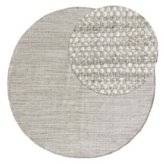 Rund grå ullmatta Norrsken med kortklippt yta i harmonisk modern inredningsmiljö