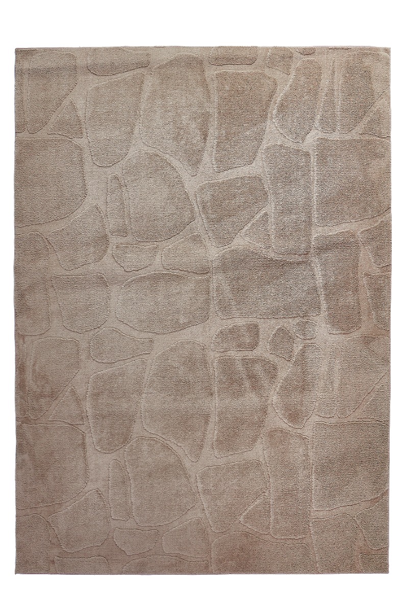 Mjuka taupefärgade Odin ryamatta i polyester med cirka 11 mm tjocklek i ett modernt vardagsrum