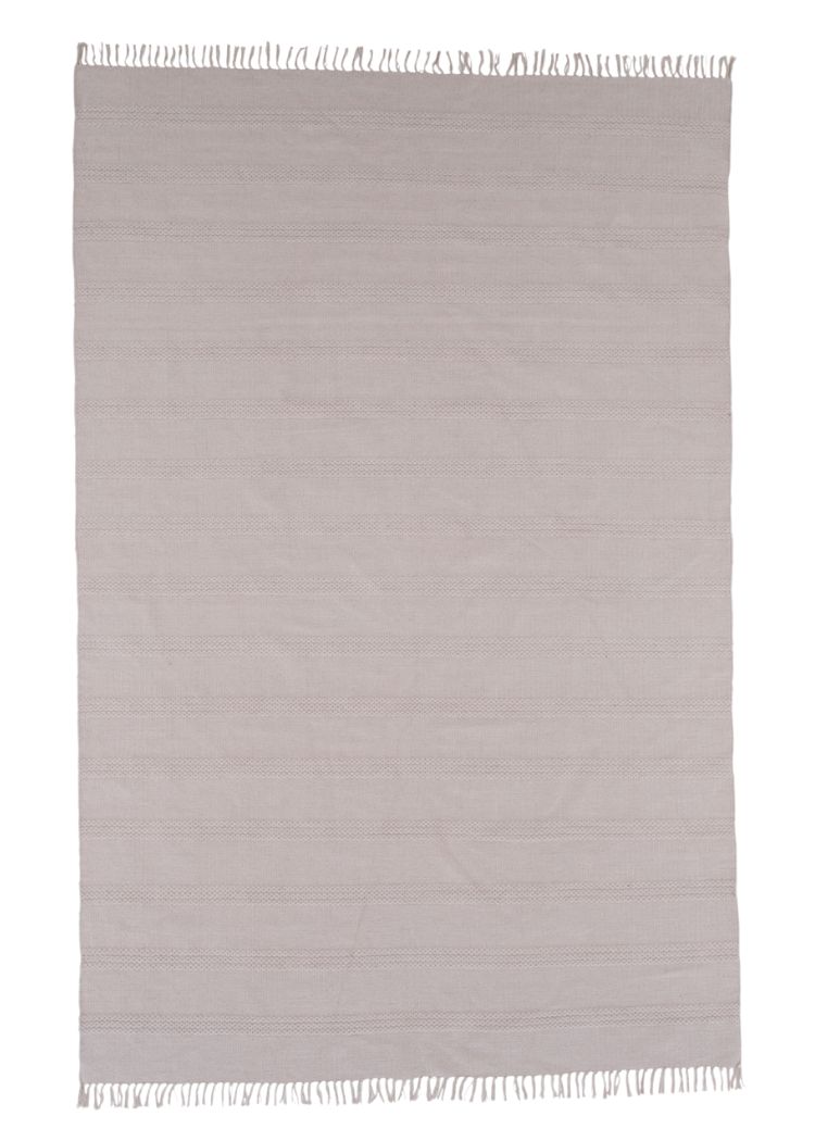 Rosita beige handvävd bomullsmatta med ullmix och dekorativa fransar i vardagsrum