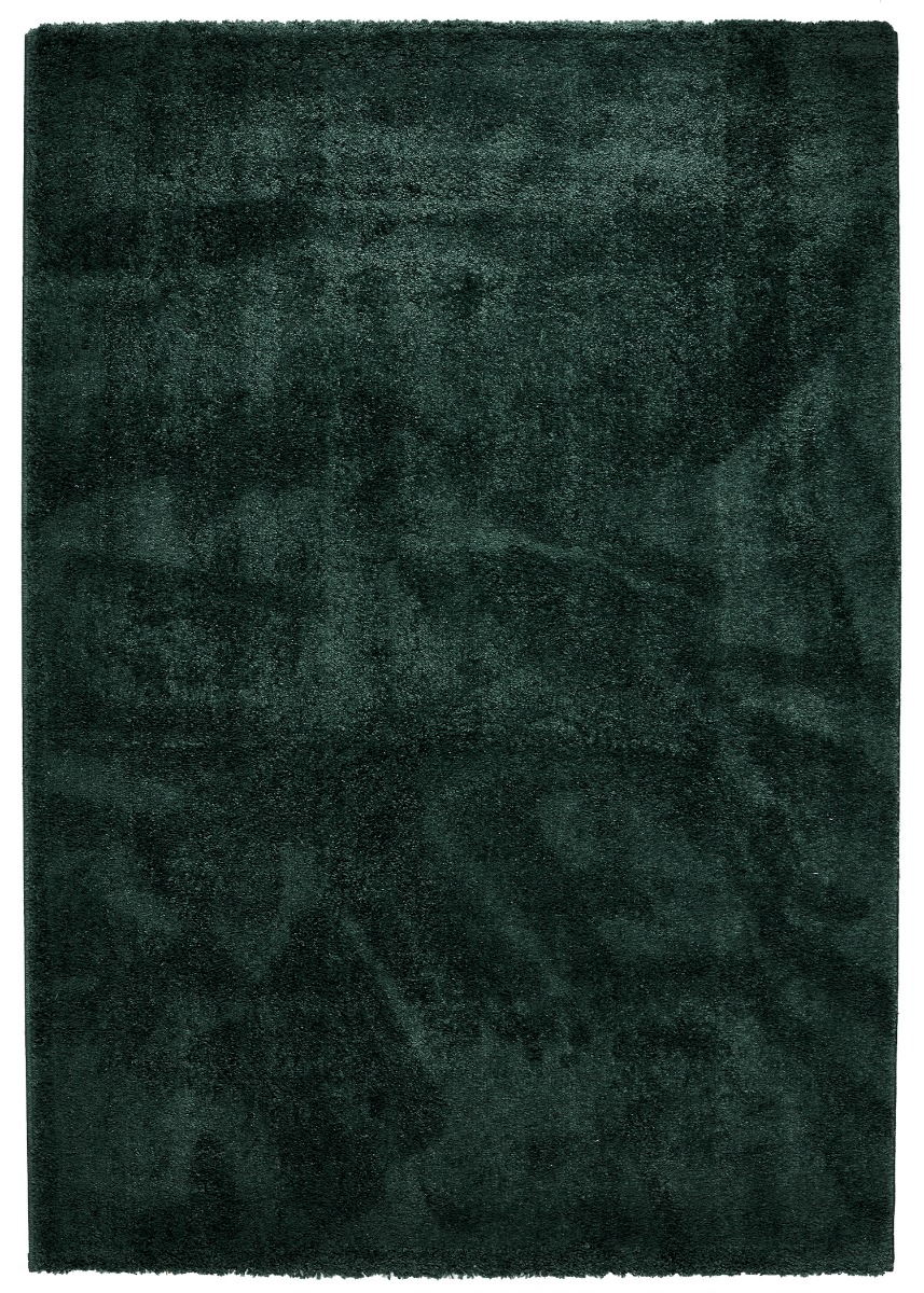 närbild på mjuk mörkgrön ryamatta med lång lugg i polypropen material