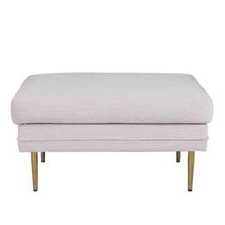 Beige manchesterpall Mistfall med smala mässingsfärgade metallben i modern nordisk design