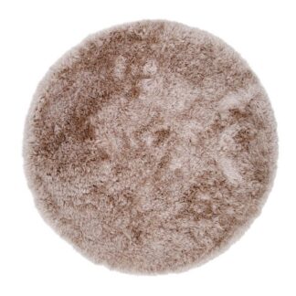 Rund beige ryamatta i mjuk 35 mm tjock polyester, placerad på golv