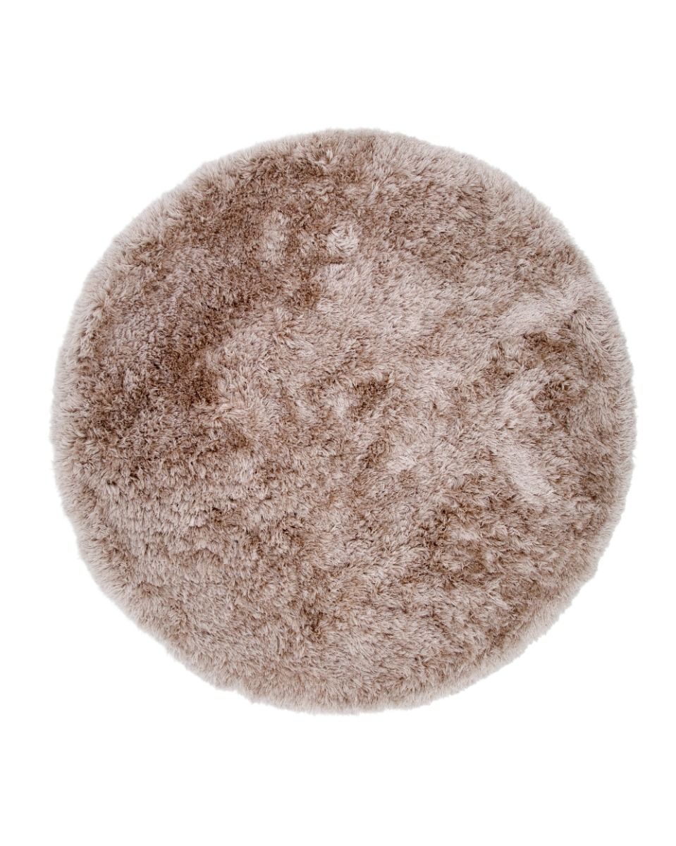 Rund beige ryamatta i mjuk 35 mm tjock polyester, placerad på golv