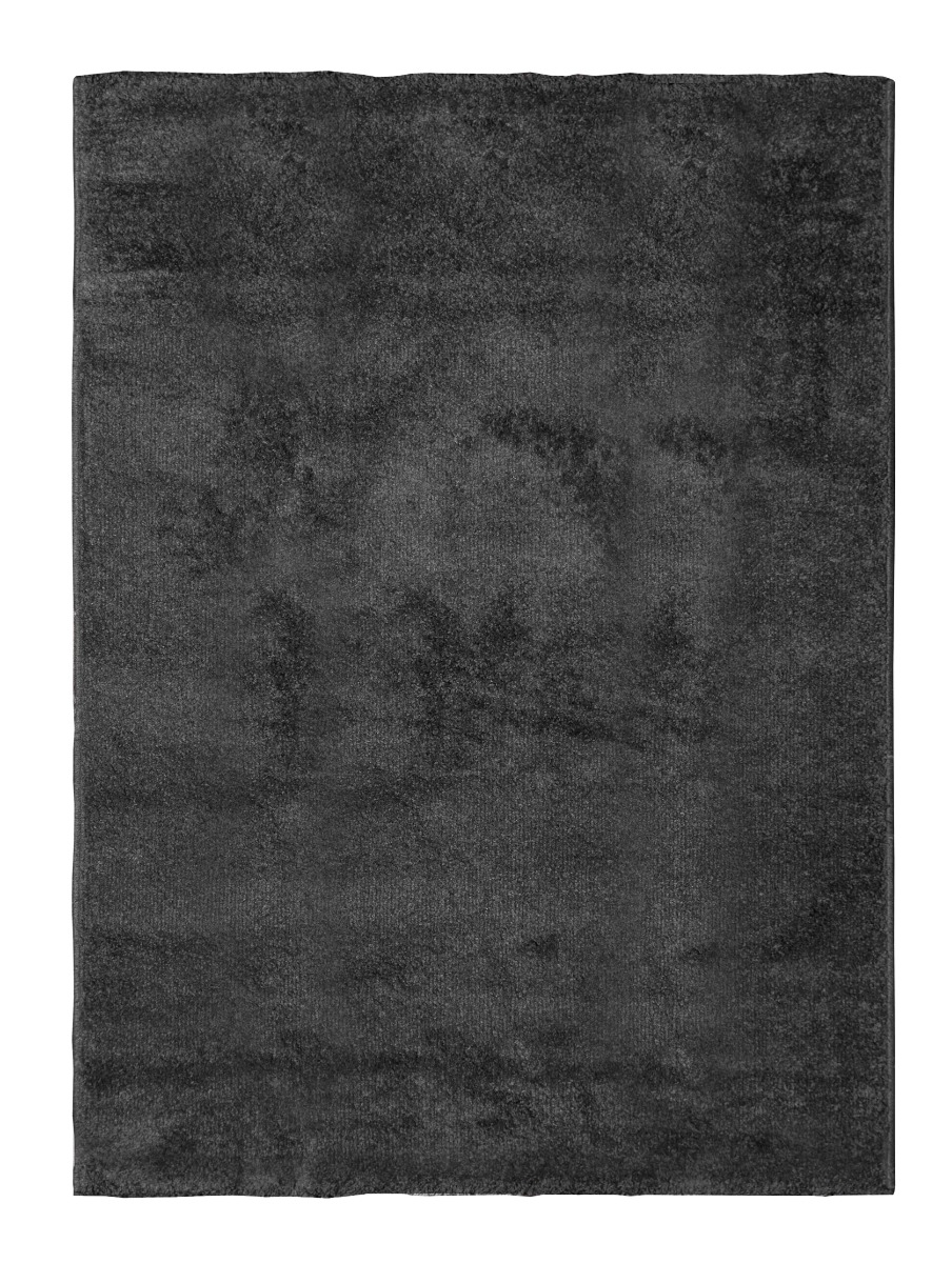 Svart mjuk plysch ryamatta med nubby struktur och djup lutning i elegant design