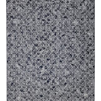 Blå viskosmatta Cob med mjuk textur och elegant design i inomhusmiljö