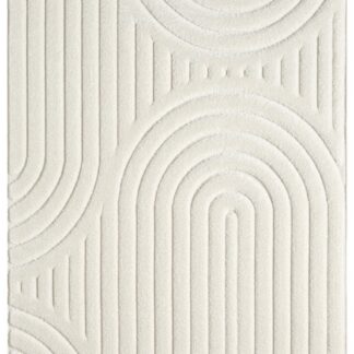 Fluffig ryamatta i offwhite färg med mjuk tjock lugg placerad i vardagsrum